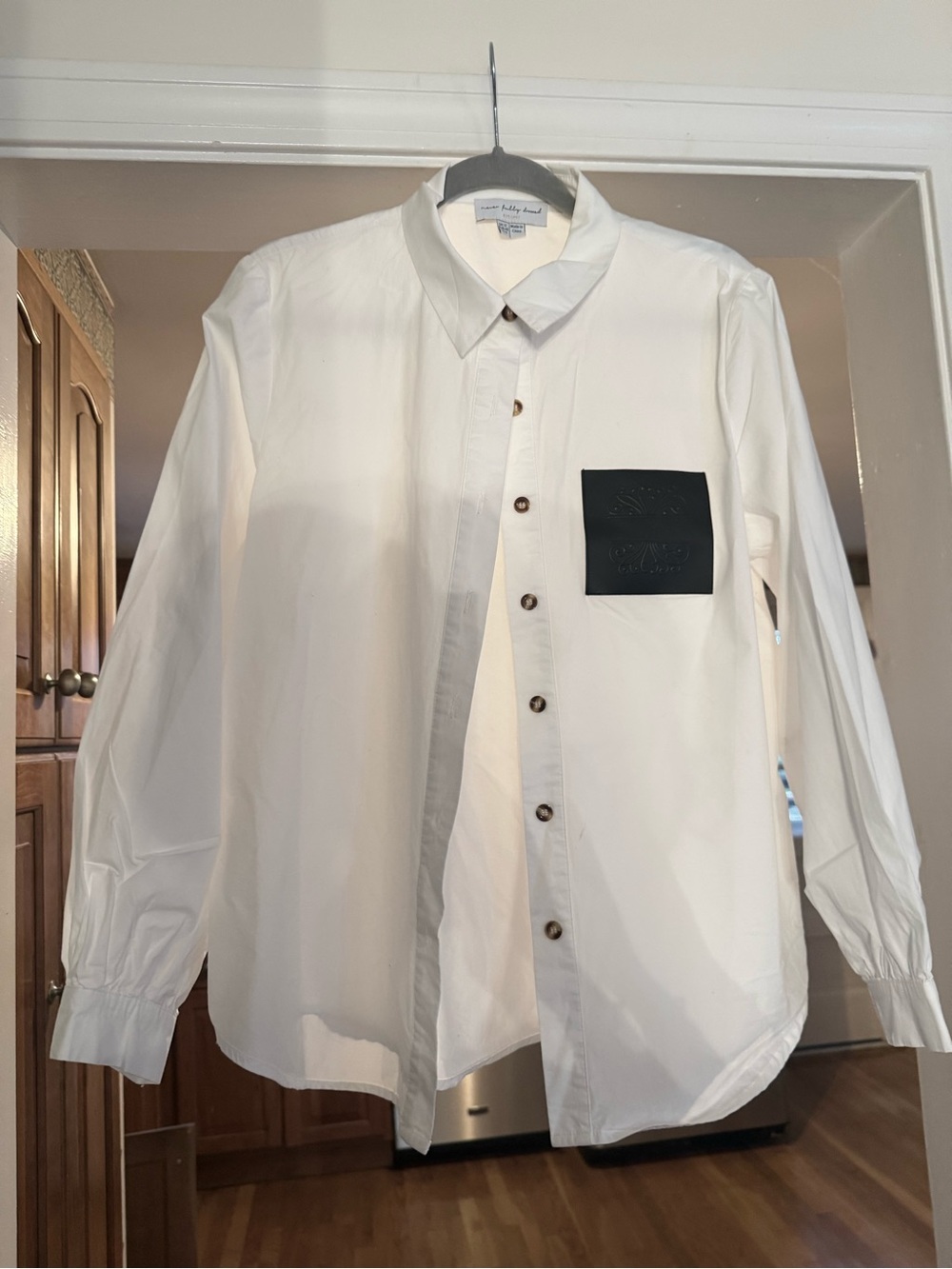 Never Fully Dressed White Button-Down Shirt with Black Chest Patch